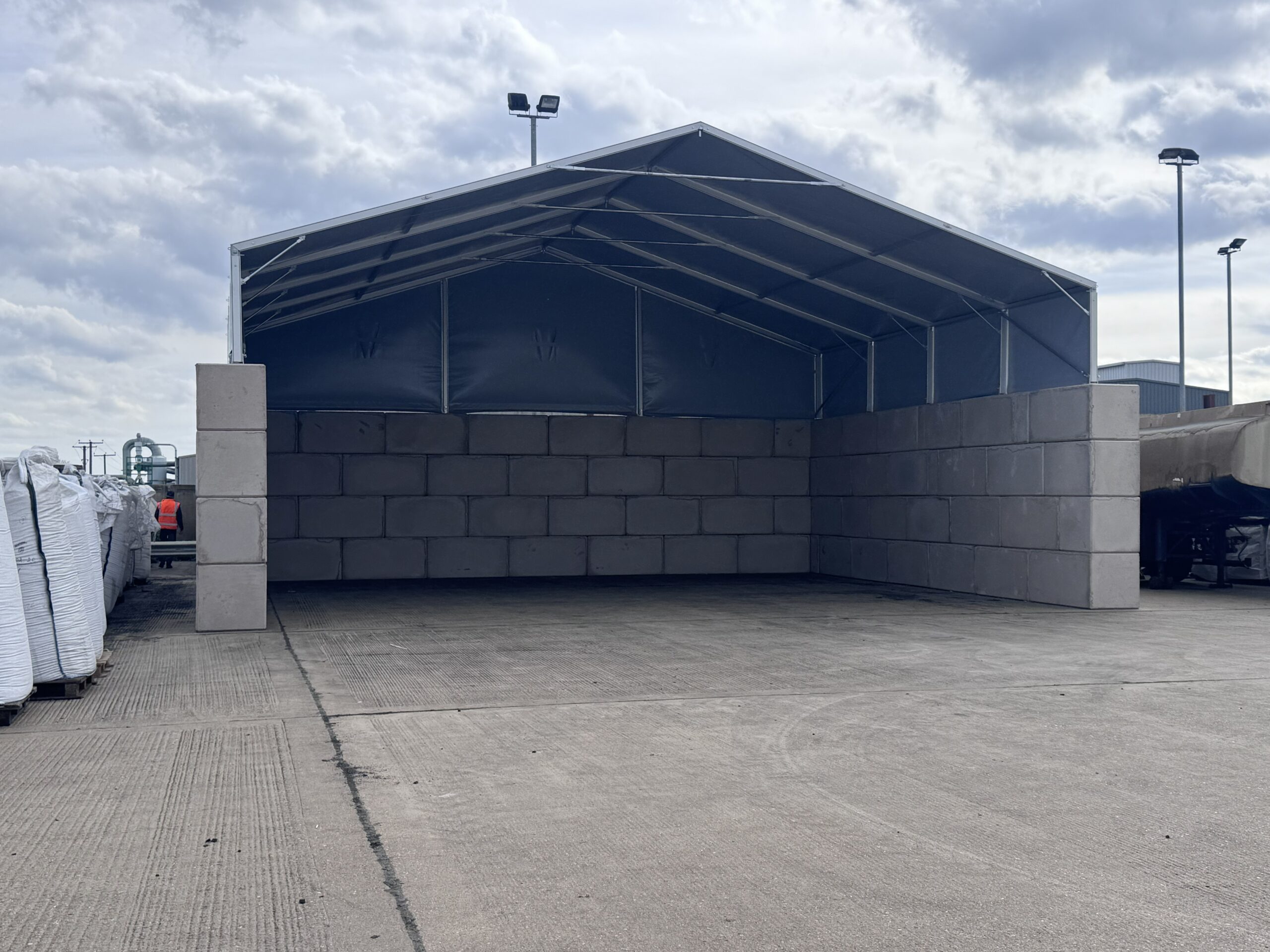 12m wide Hoecker clear span structure used as an aggregate bay cover, mounted on legato concrete blocks